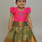 Pink and green silk pattu pavadai for girls with bow embroidery blouse and zari border skirt – Sri Thulir Tex