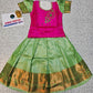 Pink and light green kids pattu pavadai set with puff sleeves and bridal silk skirt by Sri Thulir Tex