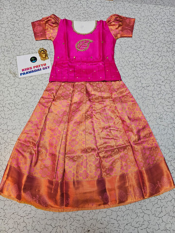 Pink and peach kids pattu pavadai set with puff sleeves and bridal silk skirt by Sri Thulir Tex