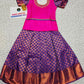 Pink and purple kids pattu pavadai set with puff sleeves and zari woven bridal silk skirt by Sri Thulir Tex
