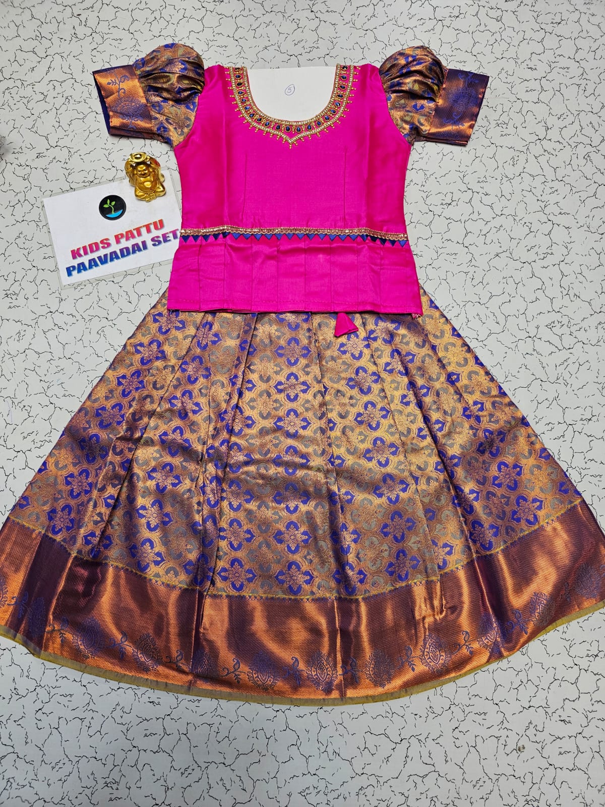 Pink and royal blue kids pattu pavadai set with puff sleeves and bridal silk skirt by Sri Thulir Tex