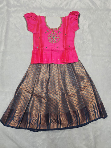 Pink semi silk and bridal silk pattu pavadai for girls with puff sleeves and stone work neck, traditional South Indian festive wear by Sri Thulir Tex