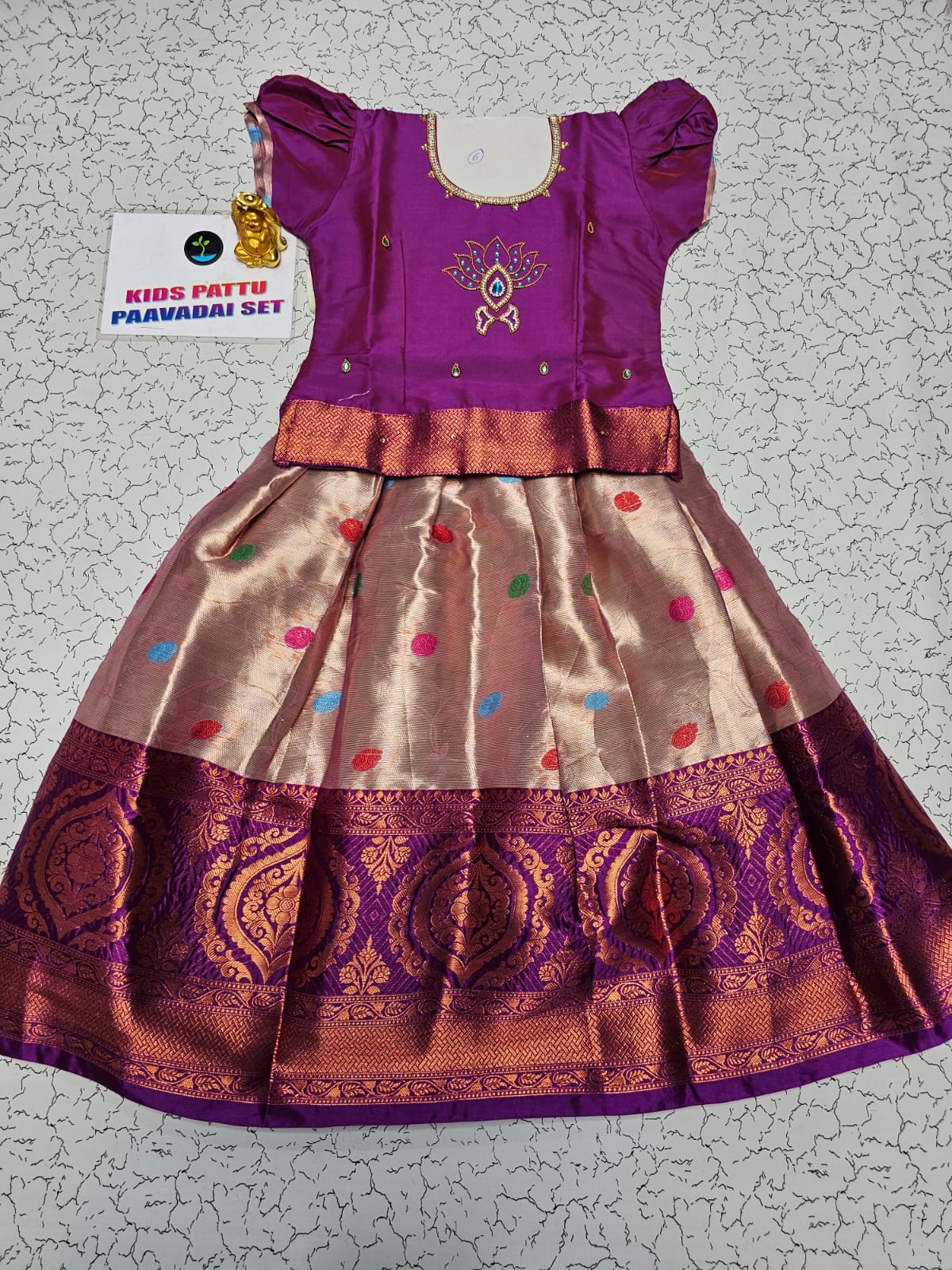 Purple and golden Banarasi semi silk pattu pavadai for girls with puff sleeve and zari border – Sri Thulir Tex