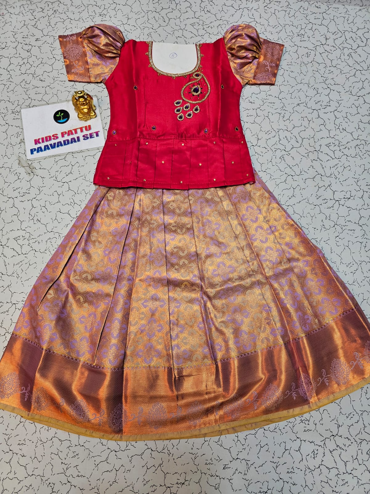 Red and lavender kids pattu pavadai set with puff sleeves and bridal silk skirt by Sri Thulir Tex