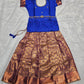 Royal blue semi silk top with antique gold bridal silk skirt pattu pavadai for girls featuring puff sleeves, waist belt design and double chain stone neck work by Sri Thulir Tex