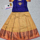 Royal blue and gold kids pattu pavadai set with puff sleeves and bridal silk skirt by Sri Thulir Tex