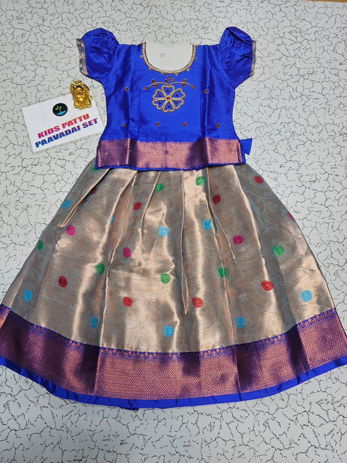 Royal blue and golden Banarasi semi silk pattu pavadai for girls with puff sleeve and elegant zari border – Sri Thulir Tex