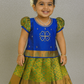 Royal blue and green silk pattu pavadai for girls with zari border and puff sleeve blouse – Sri Thulir Tex