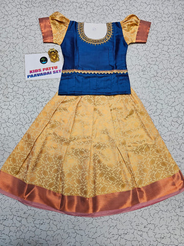 Royal blue and cream kids pattu pavadai set with puff sleeves and bridal silk skirt by Sri Thulir Tex