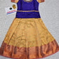 Royal purple and cream kids pattu pavadai set with puff sleeves and bridal silk skirt from Sri Thulir Tex