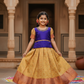 Royal purple and cream kids pattu pavadai set with puff sleeves and bridal silk skirt from Sri Thulir Tex