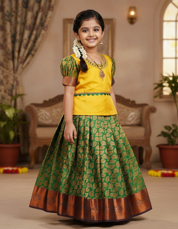 Yellow and green kids pattu pavadai set with puff sleeves and gold zari bridal silk skirt by Sri Thulir Tex