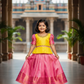 Yellow and pink kids pattu pavadai set with puff sleeves and bridal silk skirt by Sri Thulir Tex