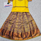 Yellow and purple kids pattu pavadai set with puff sleeves and bridal silk skirt by Sri Thulir Tex