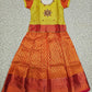 Yellow and red bridal silk pattu pavadai for kids with puff sleeves and stone work embroidery – Sri Thulir Tex South Indian traditional wear