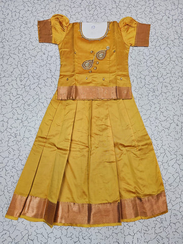 Yellow semi silk pattu pavadai for girls with puff sleeve and zari border – Sri Thulir Tex