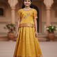 Yellow semi silk pattu pavadai for girls with puff sleeve and zari border – Sri Thulir Tex